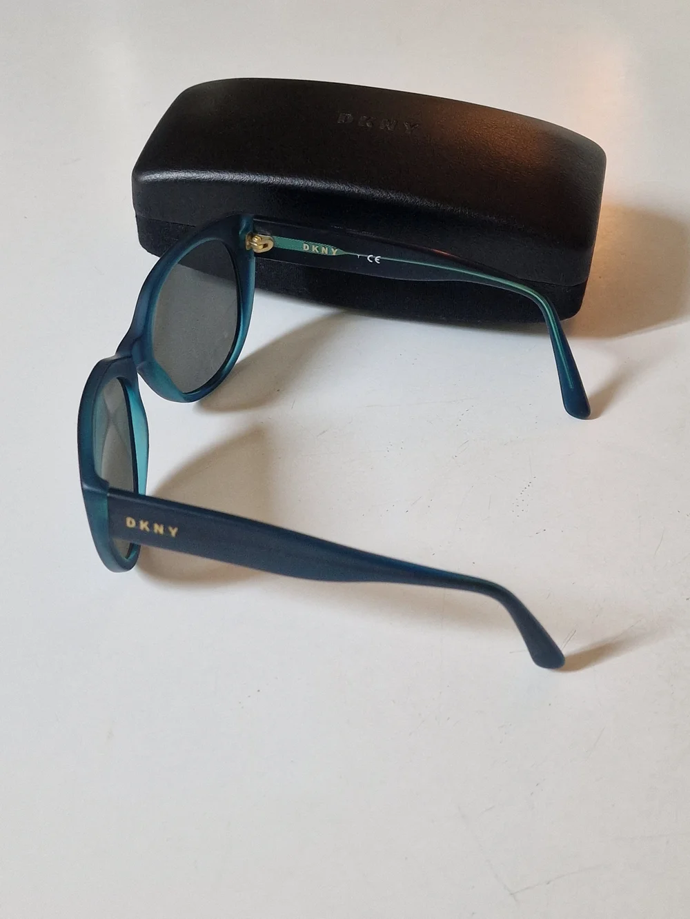 DKNY Teal Sunglasses with Gold Logo Accents